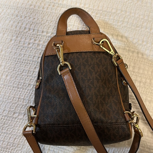 Brown and tan mini backpack. Used - Picture 3 of 5